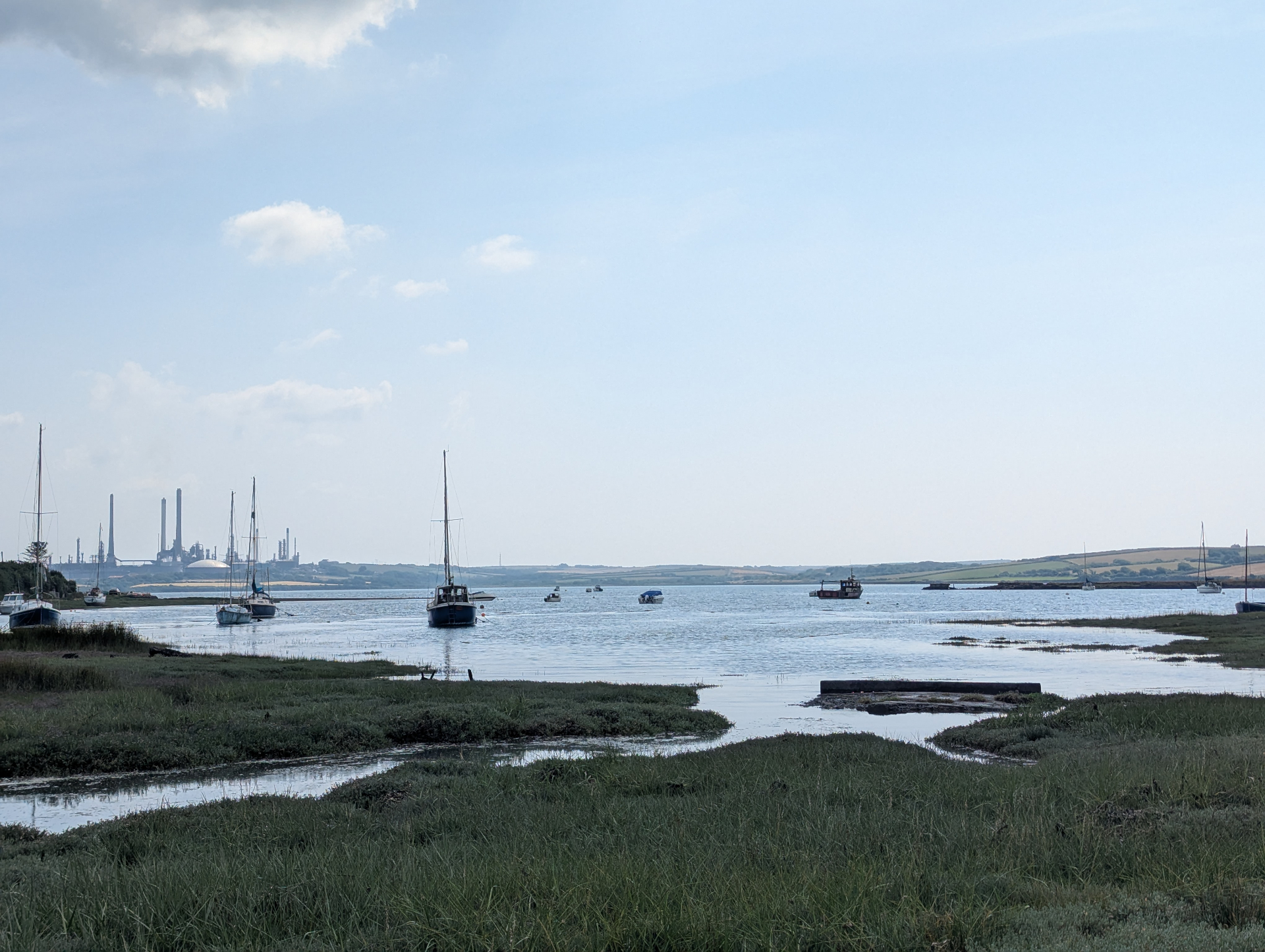 East Angle Bay - moored boats on the estuary looking across to the far shore.